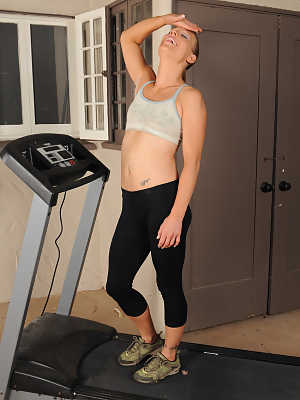 Fit American MILF Alyssa Dutch strips naked after jogging on a treadmill