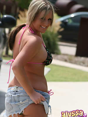 Dirty blonde amateur Alyssa Roxi hikes up a denim skirt while wearing a bikini