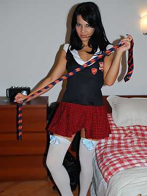 Appealing young Amabella dons schoolgirl outfit & spreads her shaved pussy