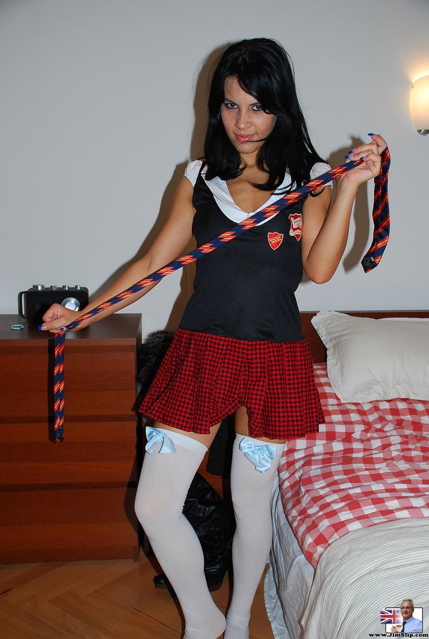 Appealing young Amabella dons schoolgirl outfit & spreads her shaved pussy