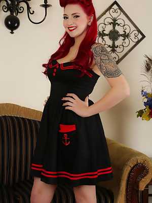 Sexy pinup Amber Ivy sheds her sailor dress to show pussy lips in red heels