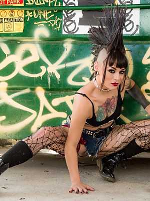 Tattooed punk rocker Amelia Dire stripping nude with hair in Mohawk