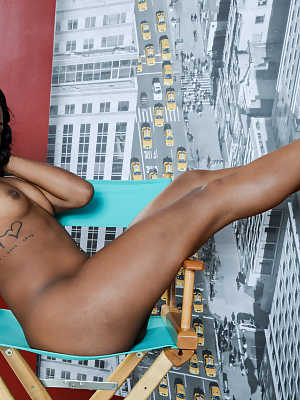 Hot ebony teen Amilian Kush flaunts trimmed pussy while modelling her hot body