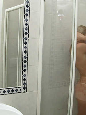 Stunning blonde with perky tiny tits Andrea Francis taking shower