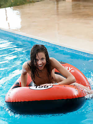 Teen with small tits Antea reveals her hot body and poses in the pool