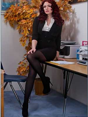 Smoking hot redhead babe Andy San Dimas stripping in the office