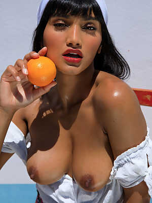 Hot babe Angel Constance strips & creams her stunning body with orange juice