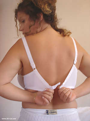 Curvy wife Angel Crisa strips her blouse & bra before measuring her big melons