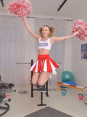 Cutie cheerleader Angel Emily in pigtails doffs uniform for three-way ass fuck