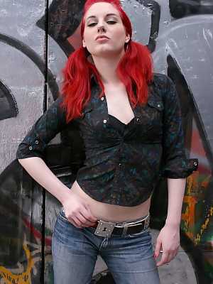 Chick with red twintails takes jeans and black T-shirt off in the alley