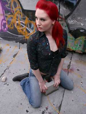 Chick with red twintails takes jeans and black T-shirt off in the alley