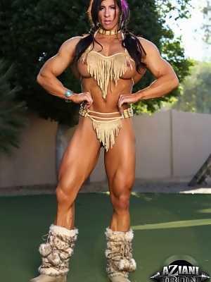 Bodybuilder Angela Salvagno flexes her muscles in Native American clothing