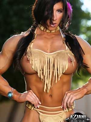 Bodybuilder Angela Salvagno flexes her muscles in Native American clothing