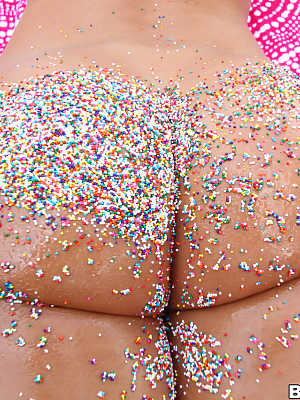 Hottie Angelica Saige gets her puffy pussy & big ass covered with sprinkles