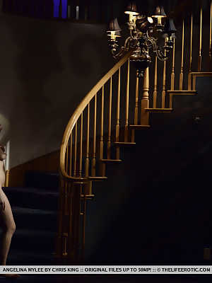 Asian model Angelina Mylee gets butt naked on a staircase in the dark