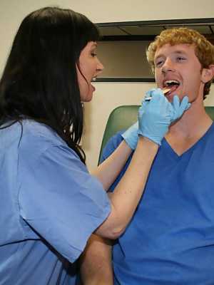 Hot nurse Angie Niore takes care of a patient by using her lips on his cock