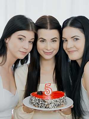 Three young girls masturbate together in white shoes during a celebration