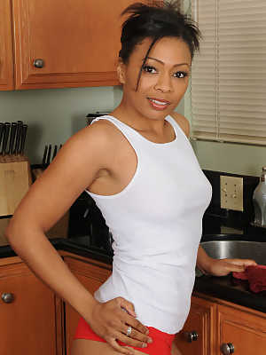 Braless ebony housewife Anita Peida strips her white shirt & red panties