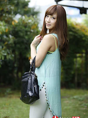 Cute Japanese girl Anna Anjo posing outdoors & stripping indoors