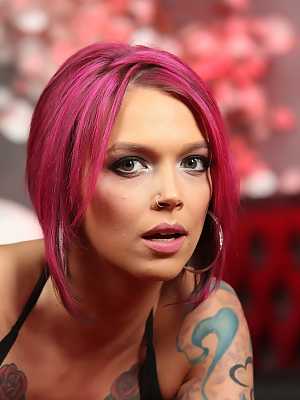 Pink haired beauty Anna Bell Peaks shows her big tits and poses in a solo
