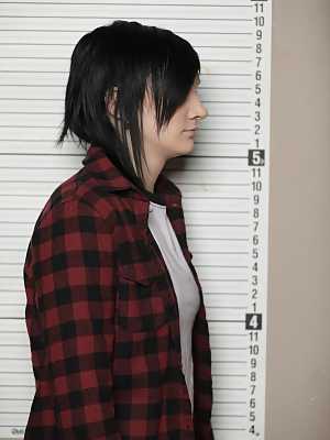 Very cute lesbian teen delinquents kissing at prison mug shot session