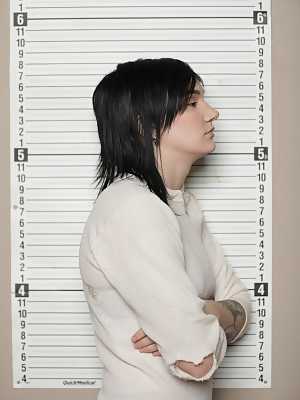 Very cute lesbian teen delinquents kissing at prison mug shot session