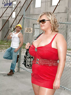 Busty blond bbw in red skirt gets caressed and kissed by a construction worker