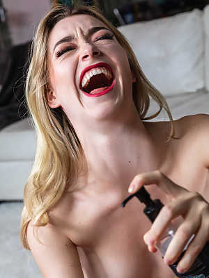 Sexy blonde with red lips takes an upskirt selfie before giving a handjob