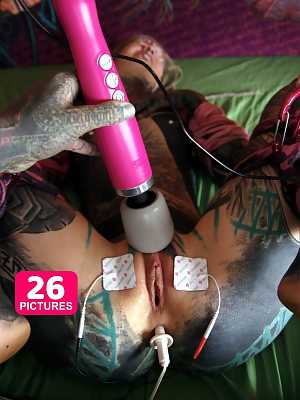 Heavily tattooed girl Anuskatzz is masturbated while awaiting a big black cock