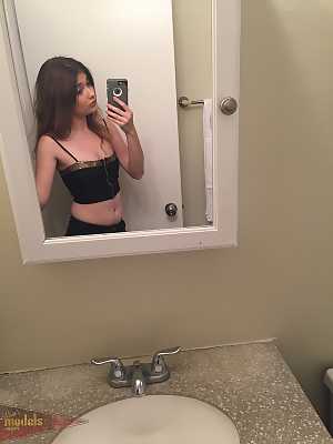 Petite teen Ariel Mc Gwire makes her nude modeling debut in bathroom selfies