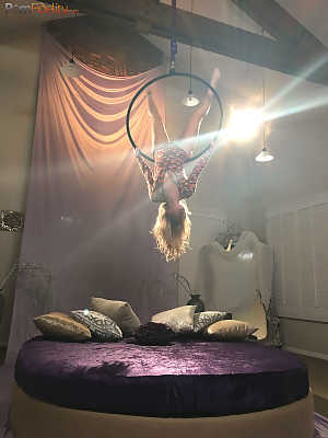 Superb blonde doll Arya Fae doing aerial yoga and showing her tits and ass