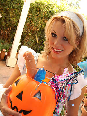 Lusty MILF next door Ashley Sweet comes calling with dildo Halloween treats