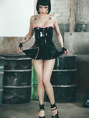 Alluring alt model flashing upskirt latex underwear in stiletto heels