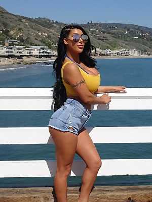 Curvy Latina August Taylor flaunts big tits at the beach & gets a POV fucking