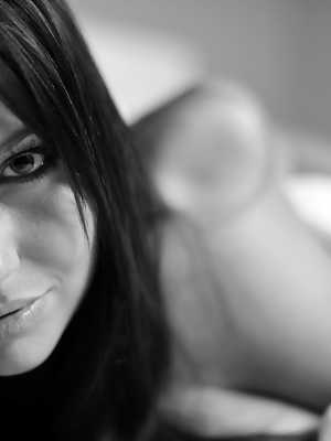 Hot amateur Ava Dawn sets forth her beautiful tits in a black and white shoot