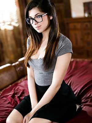 Glasses wearing nerd undressing in bedroom for first time nudes