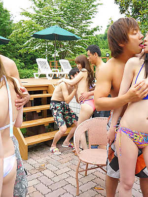 Hot Asian teens enjoying frenzied group sex in a wild pool party