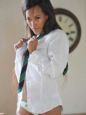 Asian glam model Ayla Sky strips to schoolgirl socks and shoes on school desk