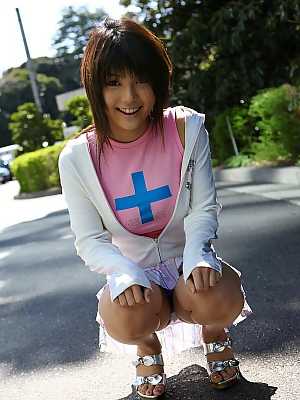 Cute Japanese girl Azumi Harusaki exposes her up skirt panties outdoors