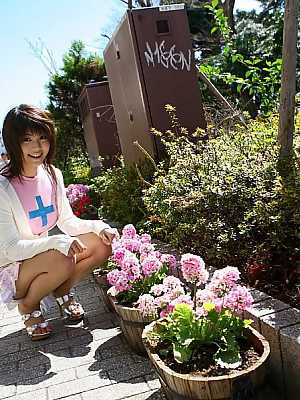 Cute Japanese girl Azumi Harusaki exposes her up skirt panties outdoors