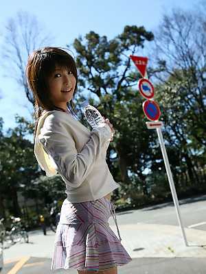 Cute Japanese girl Azumi Harusaki exposes her up skirt panties outdoors