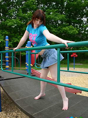 Pigtailed ginger Barbie flashes her perky tits at the playground