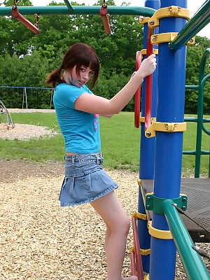 Pigtailed ginger Barbie flashes her perky tits at the playground