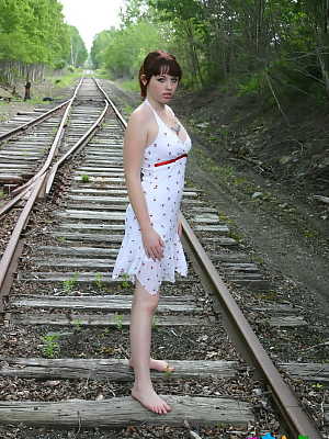 Amateur cutie B4rbi3 teases with her small firm breasts on the train tracks