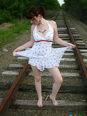 Amateur cutie B4rbi3 teases with her small firm breasts on the train tracks