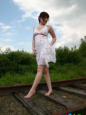 Amateur cutie B4rbi3 teases with her small firm breasts on the train tracks