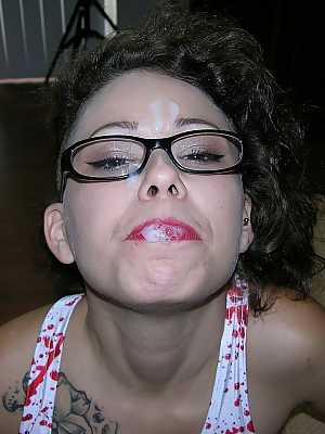 Cute young girl Bailey Paige sucks the cum from a cock while wearing glasses
