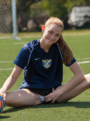 Teen footballer Bailey Rayne flashing her nip and undies on a football pitch