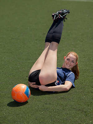 Teen footballer Bailey Rayne flashing her nip and undies on a football pitch