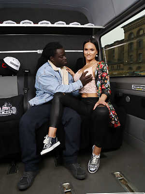 Brunette slut Barbara Bieber fucks a big black cock inside a moving van